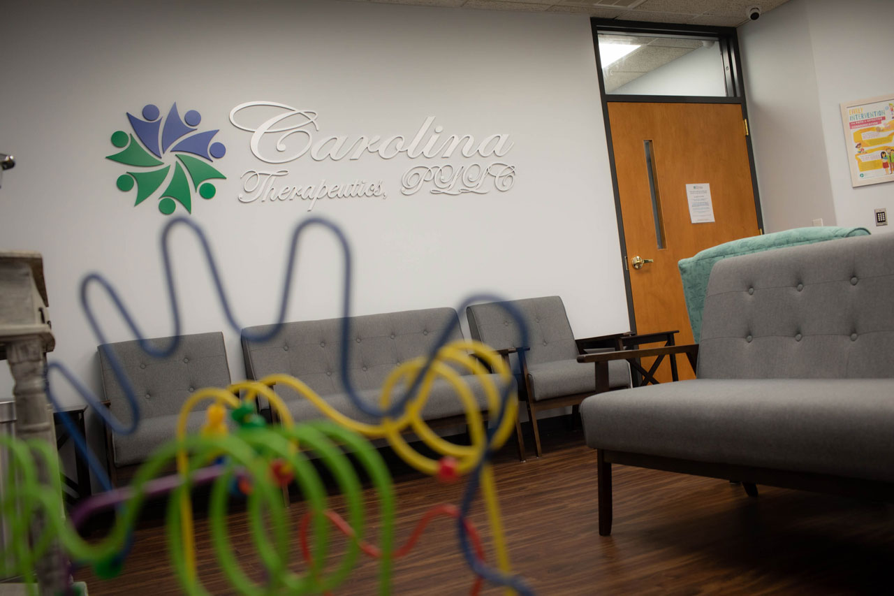 Carolina Therapeutics Greenville, NC waiting room with soft grey chairs